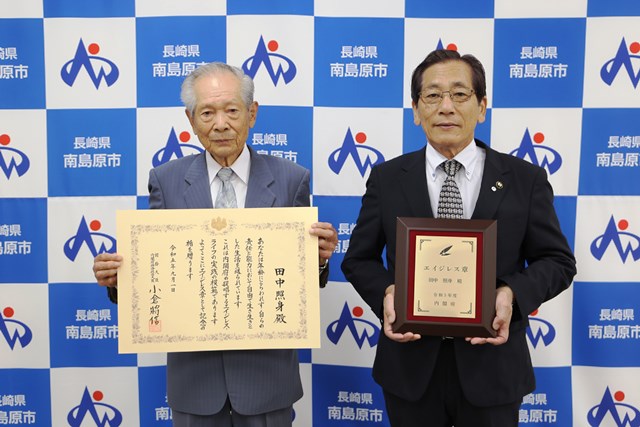 左から田中理事長、松本市長