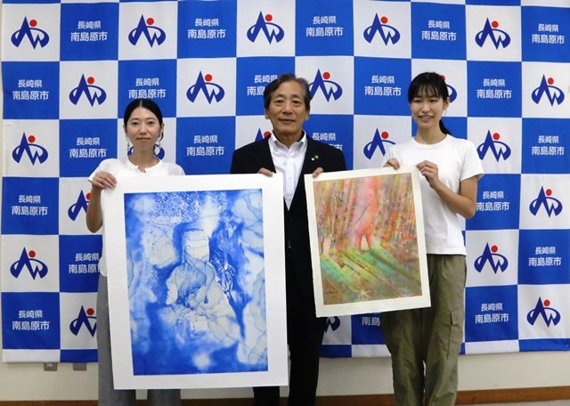 左から関さん、松本市長、山田さん